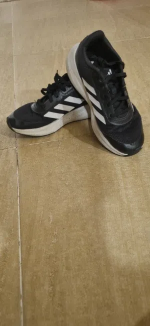 black Adidas running shoes for kids size EU 35.5