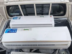two piece AC for sale in excellent condition same as brand new one is super general 2 ton
