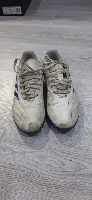 white copa pure football shoes