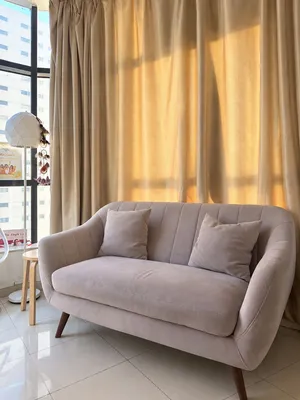 Beige 2-Seater Sofa – Excellent Condition