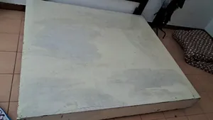 large-size bed and a sofa are available for sale.