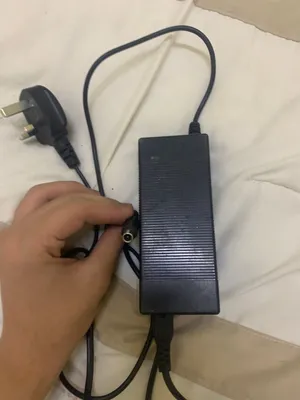شاحن سكوتر شاومي مو الأصلي تجاري بس نضيف