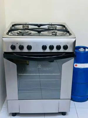 Bed and mattress Cabinet Dressing table Fridge Gas and cylinder Dining table Washing machine