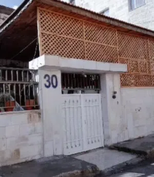 منزل مستقل  اسكن واستثمر خلف مستشفى اربد الاسلامي
