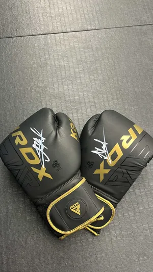 Signed RDX Gloves by Islam Makhachev – With Proof