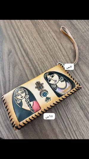 مجموعه شنط ومحفظه جلد طبيعي