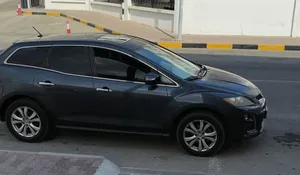 Mazda CX 7 .. Need gear work done and door lock handles.. Running car with active mulkiya and insur