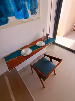 Folding table, hand made from Sissoo wood a resin, could be used as a multi purpose table, excellent