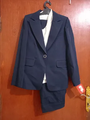 2 new suits very elegant one black and the other navy blue size 42 equivalent to L or XL بدلتين جداد