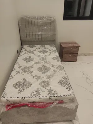 1 Single bed with side Table and one refrigerator and Washing Machine