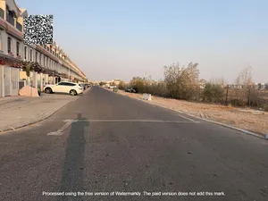 ارض للبيع بالزاهيه سكنى تجارى وسط العمار شارع الشيخ محمد بن زايد