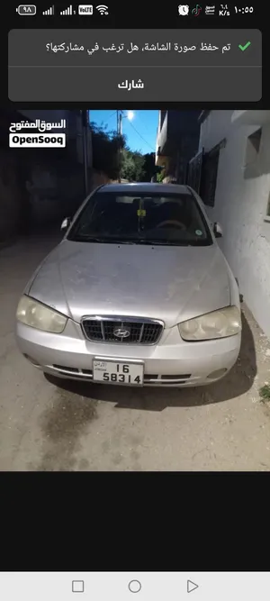 سيارة هيونداي XD 2002 فضي مستعملة مرخصة بميزات حديثة وأنظمة أمان