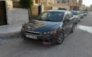 متسوبيشي لانسر فراشه GT للبيع او للبدل