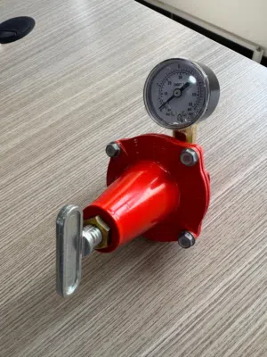Gas Regulator 12-18KG 3 bar with press gauge منظم غاز 12-18 كجم مع مقياس ضغط مع سياب للتجارة