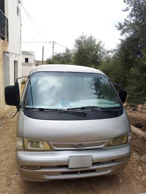 باص كيا بريجو لون شمباني حمولة 500 كيلو الوزن القائم 3000كغم موديل 1999