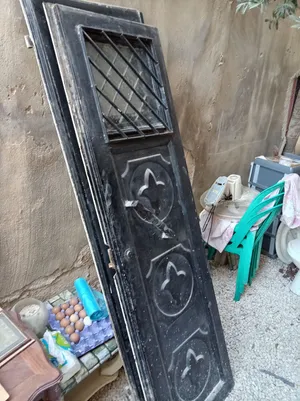 ابواب حديد وخشب باسعار حرق 25 دينار