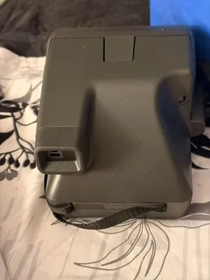 Polaroid camera and another one