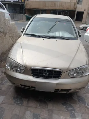 سيارة هيونداي 2001 ذهبي صالون سيدان مرخصة بكيفية ممتازة كوشوك جديد مرخصه لغاية شهر 1 قابل للتفاوض