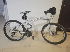 Excellent sports bicycle for sale with accessories—only 55 Dinars.