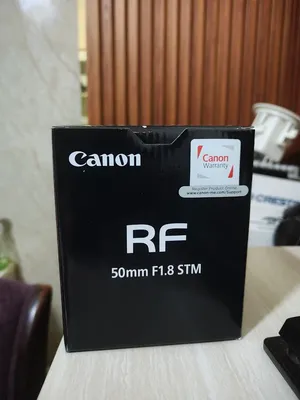 Canon RF 50mm F1.8 STM للبيع جديدة تماماً ومكفولة ب135 بدل 190