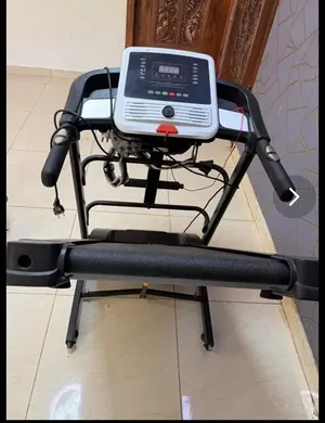 ألة مشي وهزاز وضغط معدة استخدام بسيط