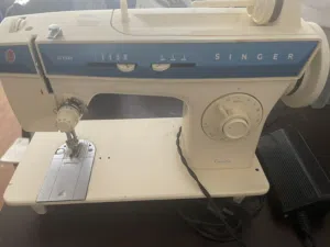 original SINGER vintage german sewing machine with accessories