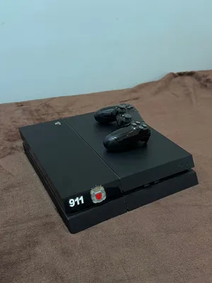 PS4 1TB with one controller and 4 games, price: 75bd