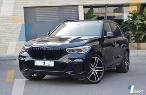 Bmw X5 Xdrive40i 2022  Mild hybrid   وارد و صيانة  الوكالة بحالة ممتازة  مالك اول فحص كامل