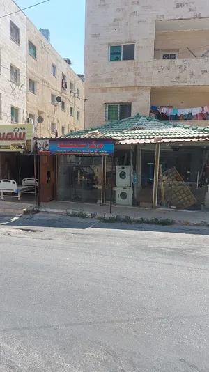 عقار تجاري للبيع اربد مقابل الباب الغربي لجامعة اليرموك