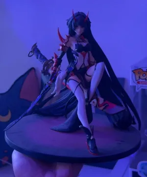 Assorted figures for sale.