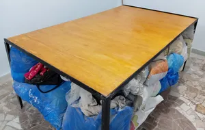ترابيزة قص قماش مستويين