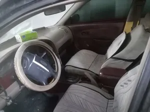 كيا سيفيا2 لون اسود موديل 2001 منتهية الترخيص بحاجة اعادة تسجيل