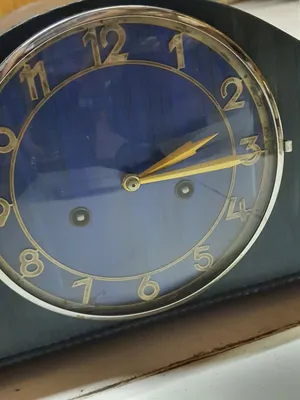 Antique German Deco style table mantel clock in oak wood from 1930