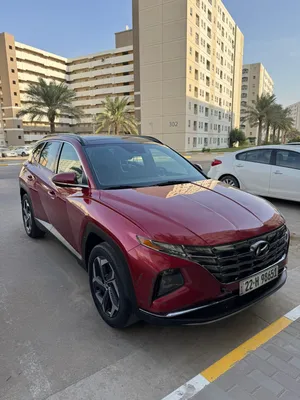 توكسان هايبرد 2022