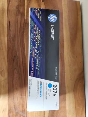 Original HP 207A Cyan Toner Cartridge (Model: W2211A) for HP LaserJet Pro printers.