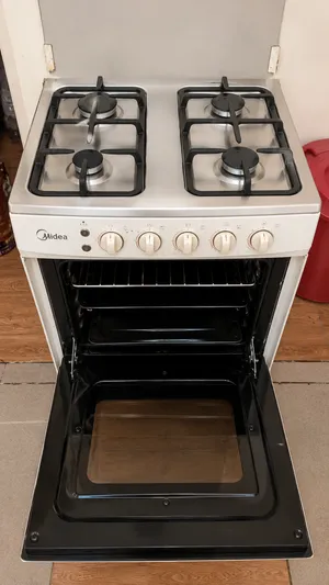 large 4 stove oven with griller midea brand used urgent selling