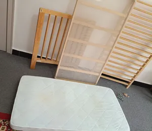 Ikea disassembled wooden Baby Cot + washable mattress