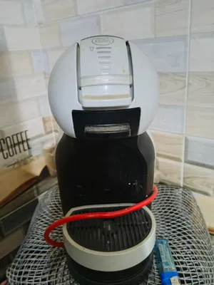 ماكينة كبسولات