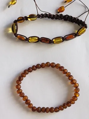 عدد 2 سوار شبابي/رجالي أحجار طبيعيه من الكهرمان البلطيقي