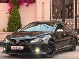 تويوتا كامري 2019 فل كامل فحص 3 جيد ضربة خلف العجل بحالة ممتازة لا تحتاج اي نوع من انواع الصيانه