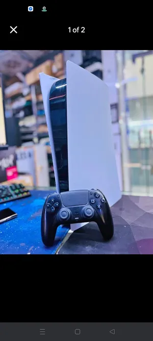 playstation 5 with controller and cables