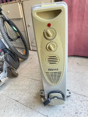 دفاية كهربائيه مركه Wansa