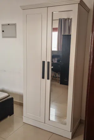 Wardrobe 2 doors with mirror .local made very strong heavy duty few month used only 210×95×55