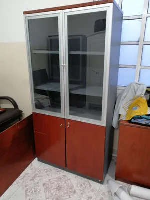 Large office galss door cabinet for sale in good condition