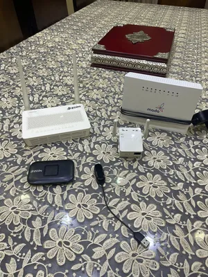 مجموعة راوترات وماي فاي ومقوي شبكة وباند ذكي
