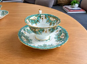 Antique Cauldon FINGAL Teal Green & Gold Chintz Footed Teacup and Saucer c.1890