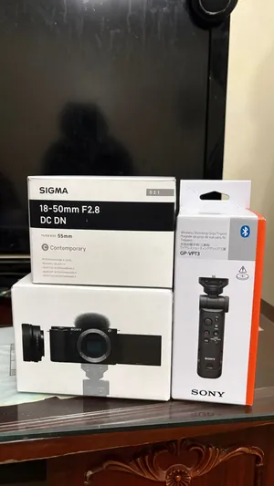 Sony ZV-E10 Camera + Sigma 18-50mm F2.8 Lens + Sony GP-VPT3 Wireless Grip Package (With Warranty)