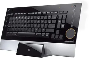 sleek, piano-black Logitech diNovo Edge Wireless Keyboard resting on its charging dock.