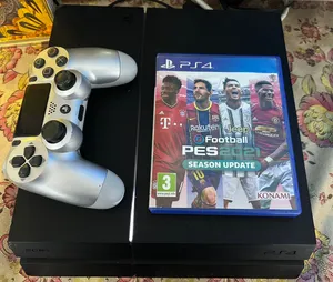 بلاستيشن فور بحالة ممتازة م تشكي من شي مع شريط pes2021