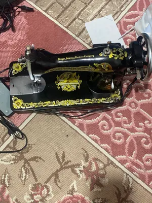 ماكينة خياطه سنجر
